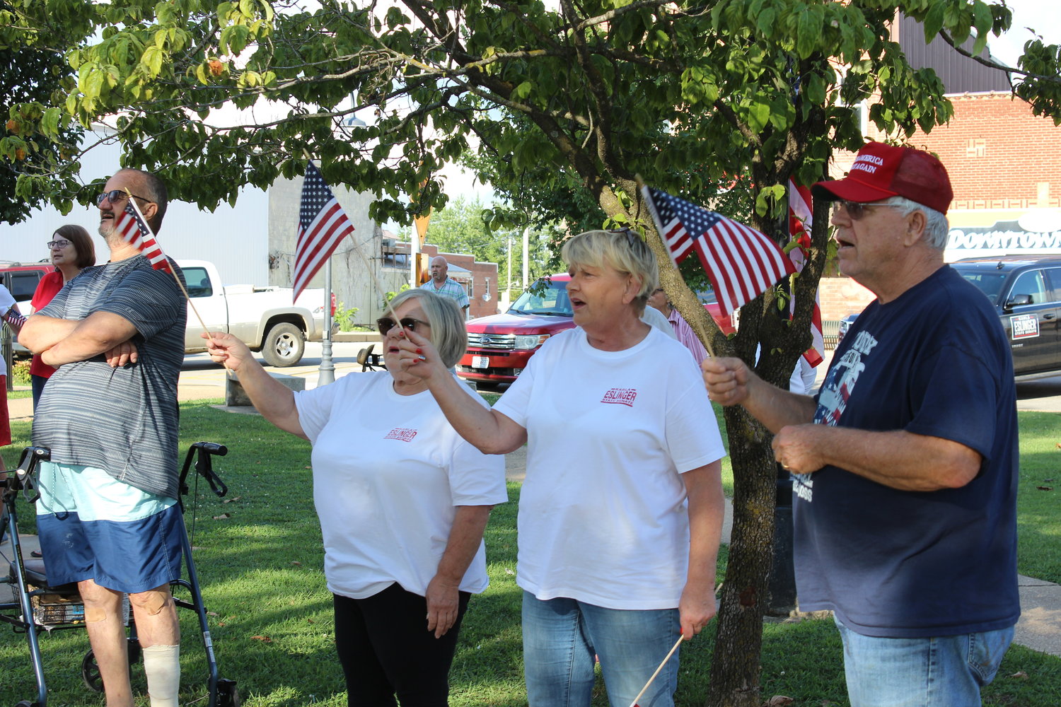 Several in attendance brought American flags to wave during the event.